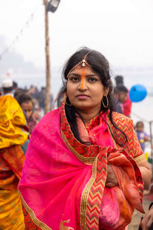 Ghaziabad, Uttar Pradesh, India - November 2021: Chhath Puja, Indian hindu devotees performing...