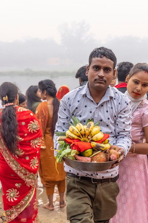 Ghaziabad, Uttar Pradesh, India - November 2021: Chhath Puja, Indian hindu devotees performing...