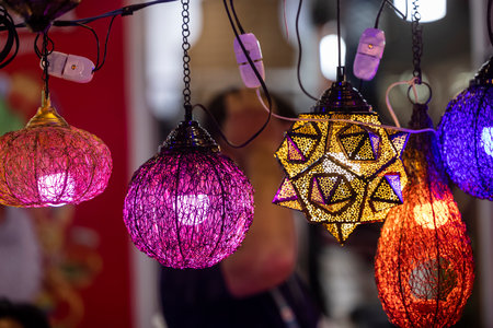 Oriental colorful glass hanging lamps or lanterns artistic selective focus background.