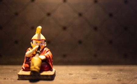 Medieval figurine of a knight on a dark background. Selective focusの写真素材