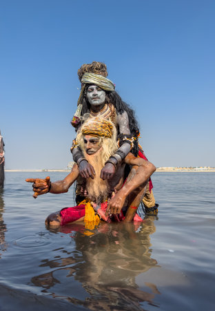 Varanasi, Uttar Pradesh, India - March 2023: Masan Holi, Portrait of an male artist with painted face act as lord shiva during the celebration of masaan holi at harishchandra ghat.のeditorial素材