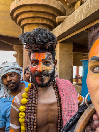 Varanasi, Uttar Pradesh, India - March 2023: Masan Holi, Portrait of an male artist with painted face act as lord shiva during the celebration of masaan holi at harishchandra ghat.のeditorial素材