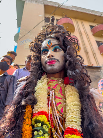 Varanasi, Uttar Pradesh, India - March 2023: Masan Holi, Portrait of an male artist with painted face act as lord shiva during the celebration of masaan holi at harishchandra ghat.のeditorial素材