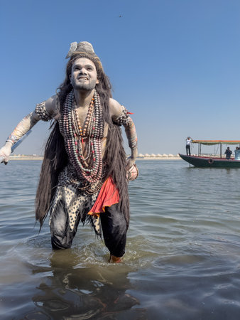 Varanasi, Uttar Pradesh, India - March 2023: Masan Holi, Portrait of an male artist with painted face act as lord shiva during the celebration of masaan holi at harishchandra ghat.のeditorial素材