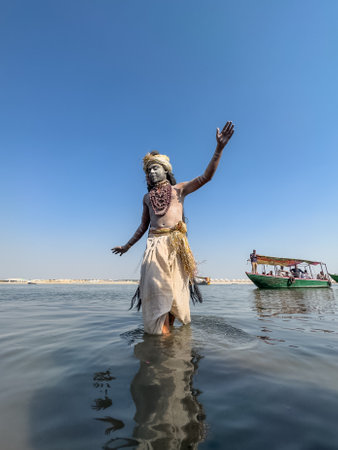 Varanasi, Uttar Pradesh, India - March 2023: Masan Holi, Portrait of an male artist with painted face act as lord Krishna during the event of masaan holi at harishchandra ghat.のeditorial素材