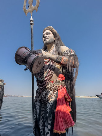Varanasi, Uttar Pradesh, India - March 2023: Masan Holi, Portrait of an male artist with painted face act as lord shiva during the celebration of masaan holi at harishchandra ghat.のeditorial素材