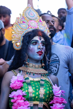 Varanasi, Uttar Pradesh, India - March 2023: Masan Holi, Portrait of an female artist with painted face act as goddess kali during the celebration of masaan holi at varanasi.のeditorial素材