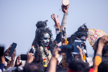 Varanasi, Uttar Pradesh, India - March 2023: Masan Holi, Portrait of an male artist with ash on face act as lord shiva during the celebration of masaan holi at harishchandra ghat.のeditorial素材