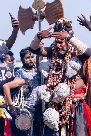 Varanasi, Uttar Pradesh, India - March 2023: Masan Holi, Portrait of an male artist with ash on face act as lord shiva during the celebration of masaan holi at harishchandra ghat.のeditorial素材