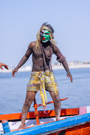 Varanasi, Uttar Pradesh, India - March 2023: Masan Holi, Portrait of an male artist with ash on face act as lord shiva during the celebration of masaan holi at harishchandra ghat.のeditorial素材