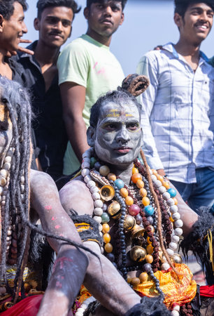 Varanasi, Uttar Pradesh, India - March 2023: Masan Holi, Portrait of an male artist with ash on face act as lord shiva during the celebration of masaan holi at harishchandra ghat.のeditorial素材