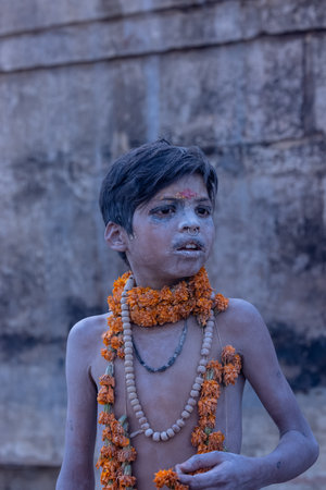 Varanasi, Uttar Pradesh, India - March 2023: Masan Holi, Portrait of an male artist with ash on face act as lord shiva during the celebration of masaan holi at harishchandra ghat.のeditorial素材
