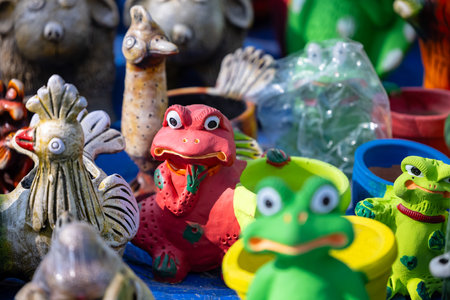 Ceramic frog souvenirs for sale in a flea marketの写真素材
