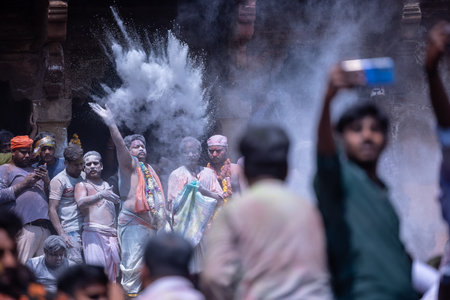 Varanasi, Uttar Pradesh, India - March 04 2023: Masan Holi, Group of india people with painted face celebrating the festival of holi at manikarnika ghat with rituals.のeditorial素材
