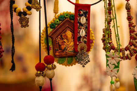 Colorful handicrafts for sale at a market in India.の写真素材