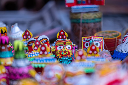 Colorful clay mask for sale at a souvenir shop in Indiaの写真素材