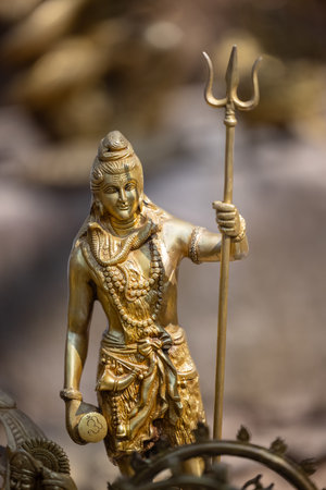Statue of a God with a trident in his hands.の写真素材