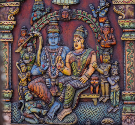 Sculpture on the wall of a temple in India.の写真素材