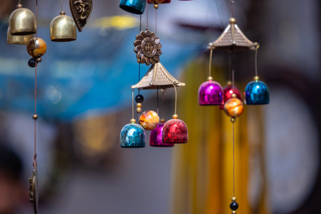 Colorful jingle bells hanging in the market.の写真素材