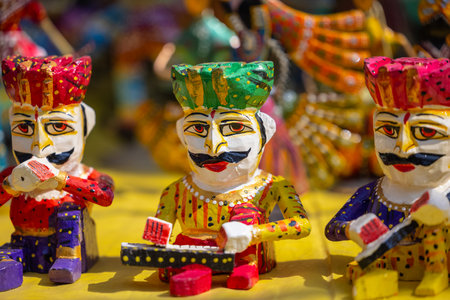 Colorful ceramic dolls for sale at a souvenir shop in Thailandの写真素材