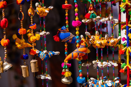 Colorful souvenirs for sale at the street market in India.の写真素材