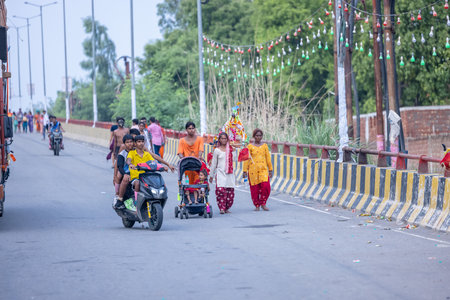 Ghaziabad, Uttar Pradesh, India - Aug 2024: Portrait of hindu pilgrims performing kanwar yatra...