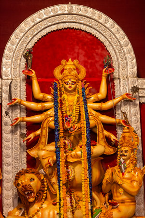 An idol of Goddess Durga decorated in Pandal. Durga Puja is the biggest religious festival of...