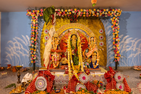 An idol of Goddess Durga decorated in Pandal. Durga Puja is a major religious festival of Hinduism and for Bengalis and is now celebrated worldwide.の写真素材