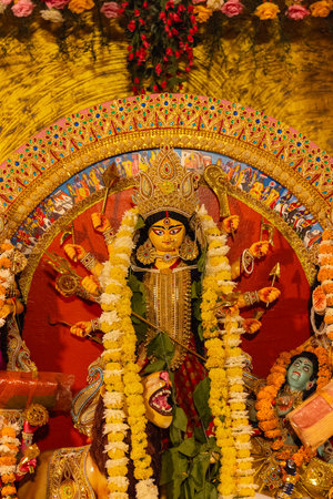 An idol of Goddess Durga decorated in Pandal. Durga Puja is biggest religious festival of Hinduism and for bengalis and is now celebrated worldwide.の写真素材