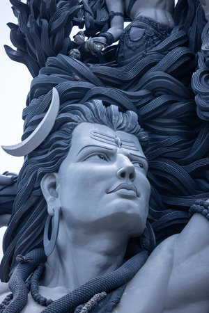 Lord Shiva, Handmade statue of lord shiv with plain background near river sea at Aazhimala in...