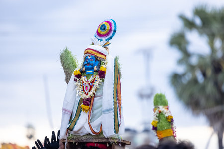 Kulasai, Idol of hindu god sri mutharamman carrying by devotees during the celebration of kulasai dasara festival.の写真素材