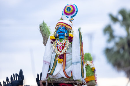 Kulasai, Idol of hindu god sri mutharamman carrying by devotees during the celebration of kulasai dasara festival.の写真素材