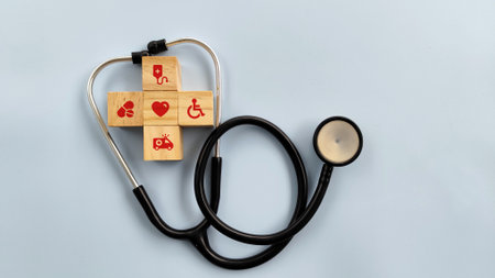 The plus sign and healthcare medical icon inside stethoscope on blue background, Health, insurance conceptの写真素材