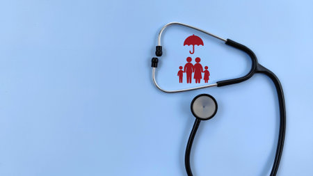 Family icon with stethoscope on blue background. healthcare, family insurance, protection conceptの写真素材