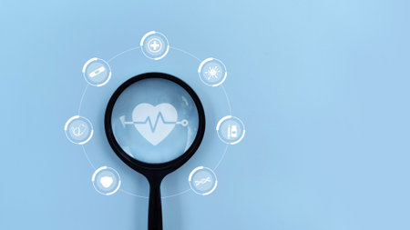 Magnifying glass focus on healthcare medical icon against blue background. Health insurance, medical technology concept. People awareness to healthcare medical, healthy and lifestyの写真素材