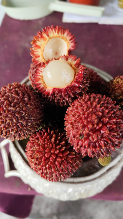 Pulasan fruit, a tropical relative of rambutan native to Southeast Asia on a bowl