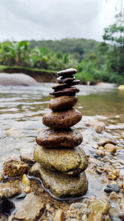 Stacked river stones symbolizing balance, harmony, mindfulness, and inner peace.の写真素材
