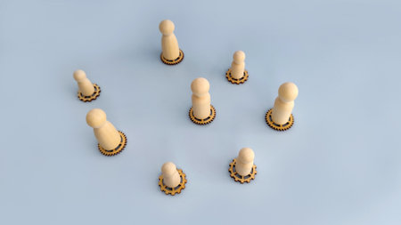 Wooden peg people standing on gear bases arranged as a team structure concept, symbolizing leadership, organization, roles, and business system.の写真素材