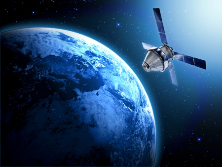 blue planet earth and satellite in spaceの写真素材