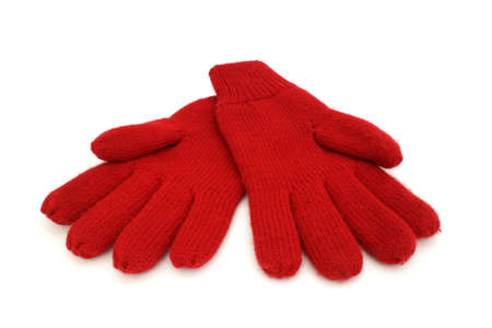 Bright red woolen gloves on a white background