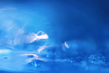 Abstract surreal macro shot of liquid soap and water 