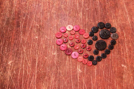heart from red and black buttons 