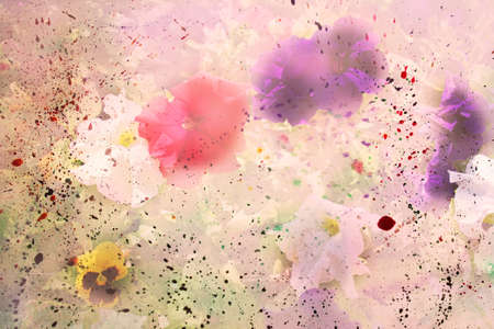 Field of flowers with watercolor splatter の写真素材