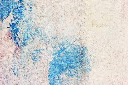 old dirty grunge parchment with blue blotches の写真素材