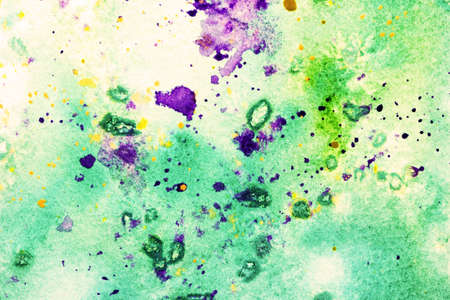 green and purple watercolor splatter の写真素材