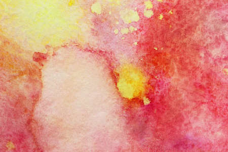 red smudges and yellow watercolor splashes の写真素材