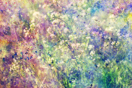 grunge colorful watercolor splatter and small blooming flowersの写真素材