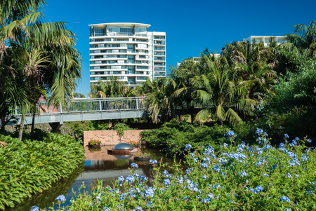 Apartments overlooking a pond in Brisbane Botanical Gardens