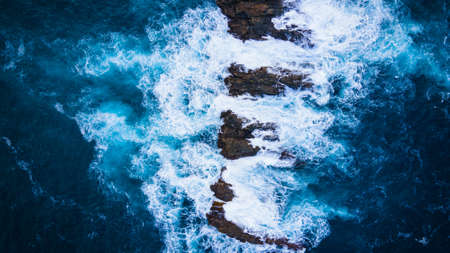 Photo with drone of the rocks in the ocean in Canary Islands in Tenerife