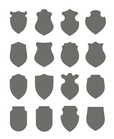 Vector blank medieval frames collection. Set of black empty shields silouettes. Ancient insignia or logo templates.のイラスト素材